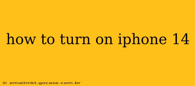 how to turn on iphone 14