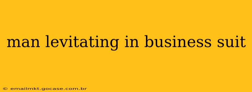 man levitating in business suit